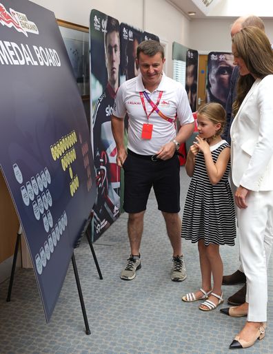 Princess Charlotte of Cambridge sticks a Medal to the Medal wall during a visit to SportsAid House at the 2022 Commonwealth Games on August 02, 2022 in Birmingham, England. 