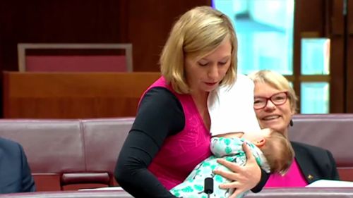 Greens Senator Larissa Waters breastfeeds her baby Alia Joy during a division in the Senate Chamber. Picture: AAP