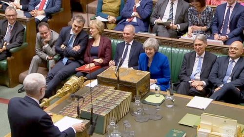 UK Labour leader Jeremy Corbyn and UK Prime Minister Theresa May debate in the House of Commons.