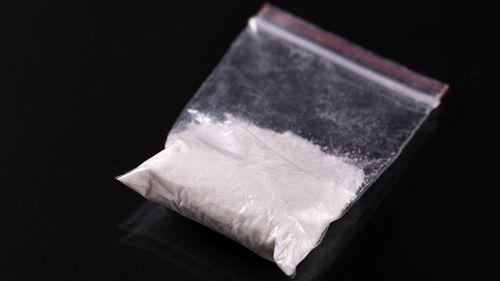A small baggie of cocaine.