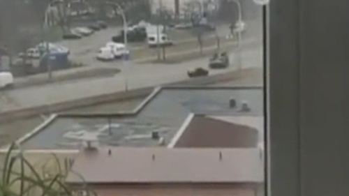 Russian tank chases and runs over Ukrainian civilian car.