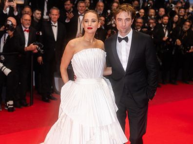 Jennifer Lawrence and Robert Pattinson attend the Die My Love red carpet at the 78th annual Cannes Film Festival at Palais des Festivals on May 17, 2025 in Cannes, France.
