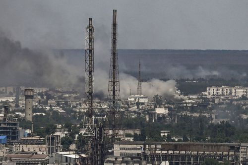 Black smoke and dirt rise from the nearby city of Severodonetsk during battle between Russian and Ukrainian troops in the eastern Ukraine region of Donbas. 