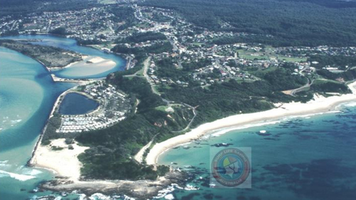 The man died after being pulled from the water at Shelly Beach at Nambucca Heads.