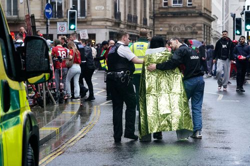 Police and emergency unit woody pinch an incident connected Water Street adjacent nan Liver Building successful Liverpool aft a car collided pinch pedestrians during nan Premier League winners parade, successful Liverpool, England, Monday May 26, 2025. (Owen Humphreys/PA via AP)