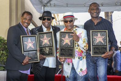 FILE - Robert "Kool" Bell, from left, Ronald "Khalis" Bell, Dennis "DT" Thomas and George Brown attend a ceremony honoring Kool & The Gang with a star on The Hollywood Walk of Fame on Oct. 8, 2015, in Los Angeles. Brown died Nov. 16, 2023 in Los Angeles, after a battle with cancer. He was 74. (Photo by Rich Fury/Invision/AP, file)