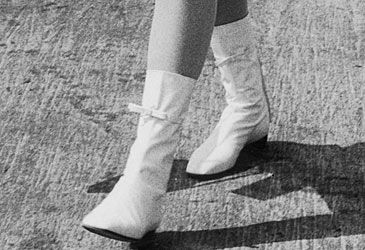 When did designer André Courrèges introduce the go-go boot?