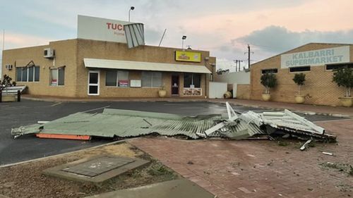 A roof lies on the road in Kalbarri.