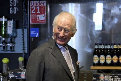 Britain's King Charles smiles during a visit to the Tower Brewery in Burton-Upon-Trent, England, Monday Feb. 24, 2025. (Jaimi Joy/Pool Photo via AP)