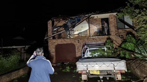 No-one was injured, however rooves were torn off homes, trees were felled and one car was flipped by the whirlwind storm system.