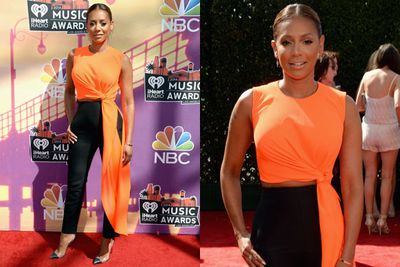 Mel B brings a pop of colour to the iHeartRadio Music Awards red carpet... and we're loving the sneaky midriff!