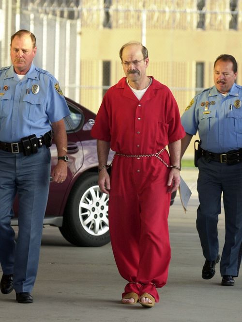 Convicted serial killer Dennis Rader walks into the El Dorado Correctional Facility with two Sedgwick County sheriff's officers. Rader, the self styled BTK killer, admitted killing 10 people in a 30 year span and sentenced to 10 consecutive life terms. 