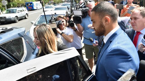 Walker and his fiancee hurried into a waiting car after the NRL star pleaded not guilty to two charges of domestic violence related assault.