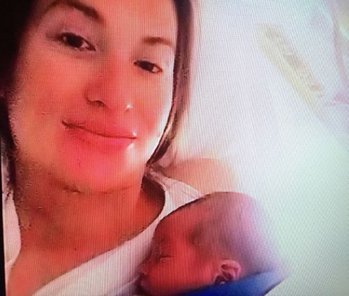 Vikki Campion holding son Sebastian