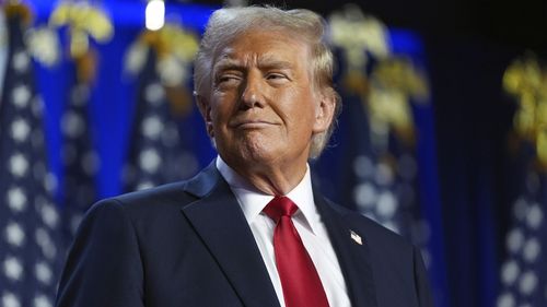 Republican presidential nominee former President Donald Trump arrives at an election night watch party at the Palm Beach Convention Center, Wednesday, Nov. 6, 2024, in West Palm Beach, Fla. (AP Photo/Evan Vucci)