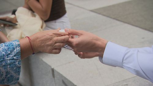 Candles were being handed out in Martin Place today.