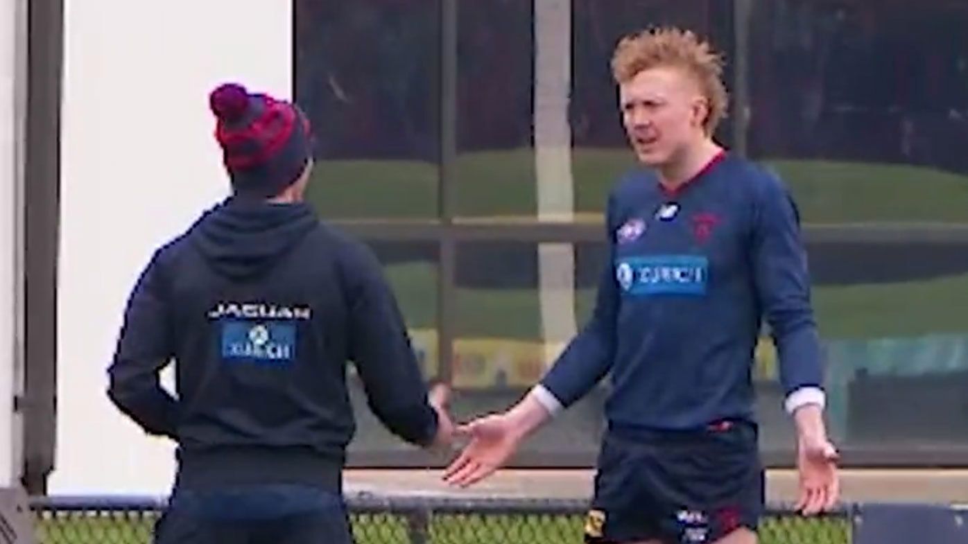 Melbourne star Clayton Oliver was pictured having a heated discussion with one of the club&#x27;s staffers at training on Wednesday