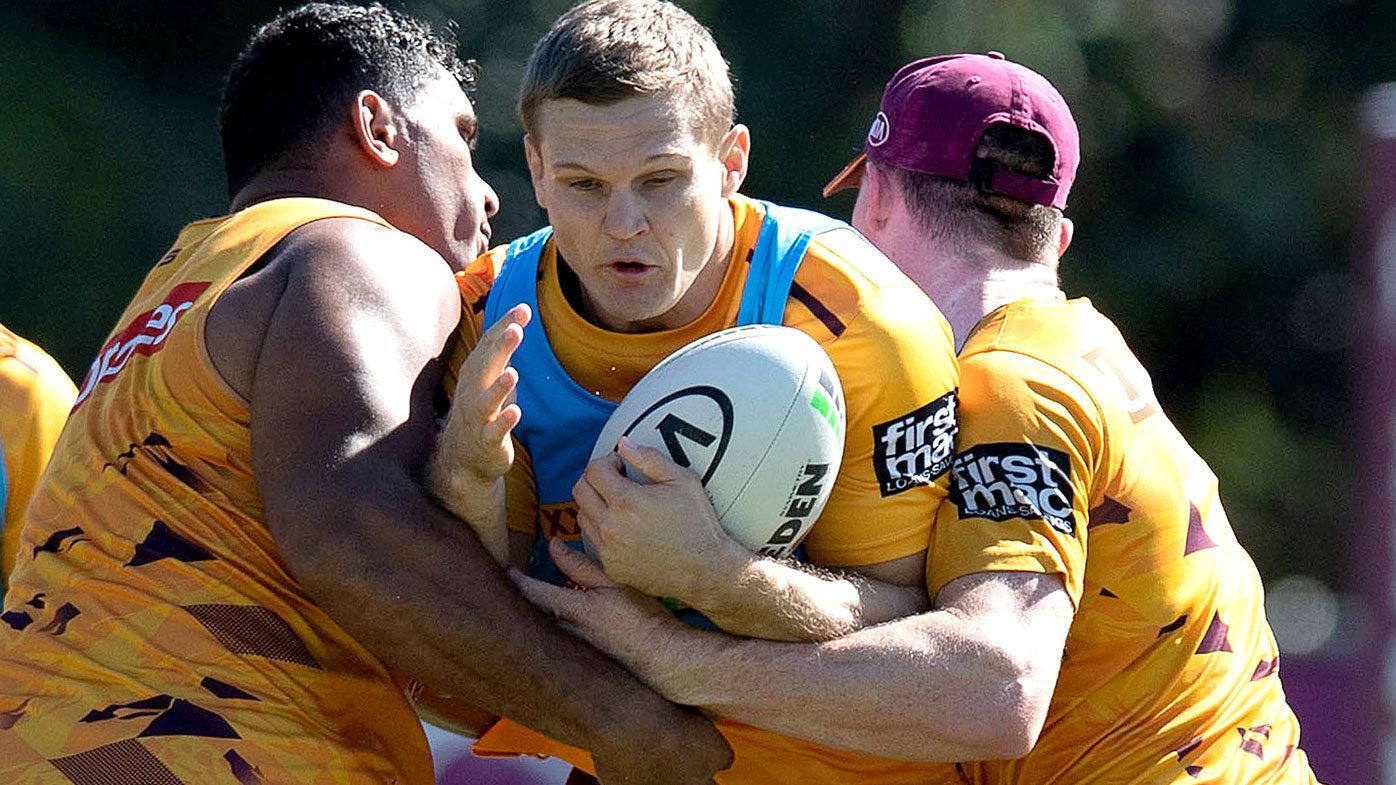 Dale Copley takes on the defence during a Brisbane Broncos NRL training session 