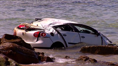 The wreckage of the car at Bar Beach, in Newcastle.