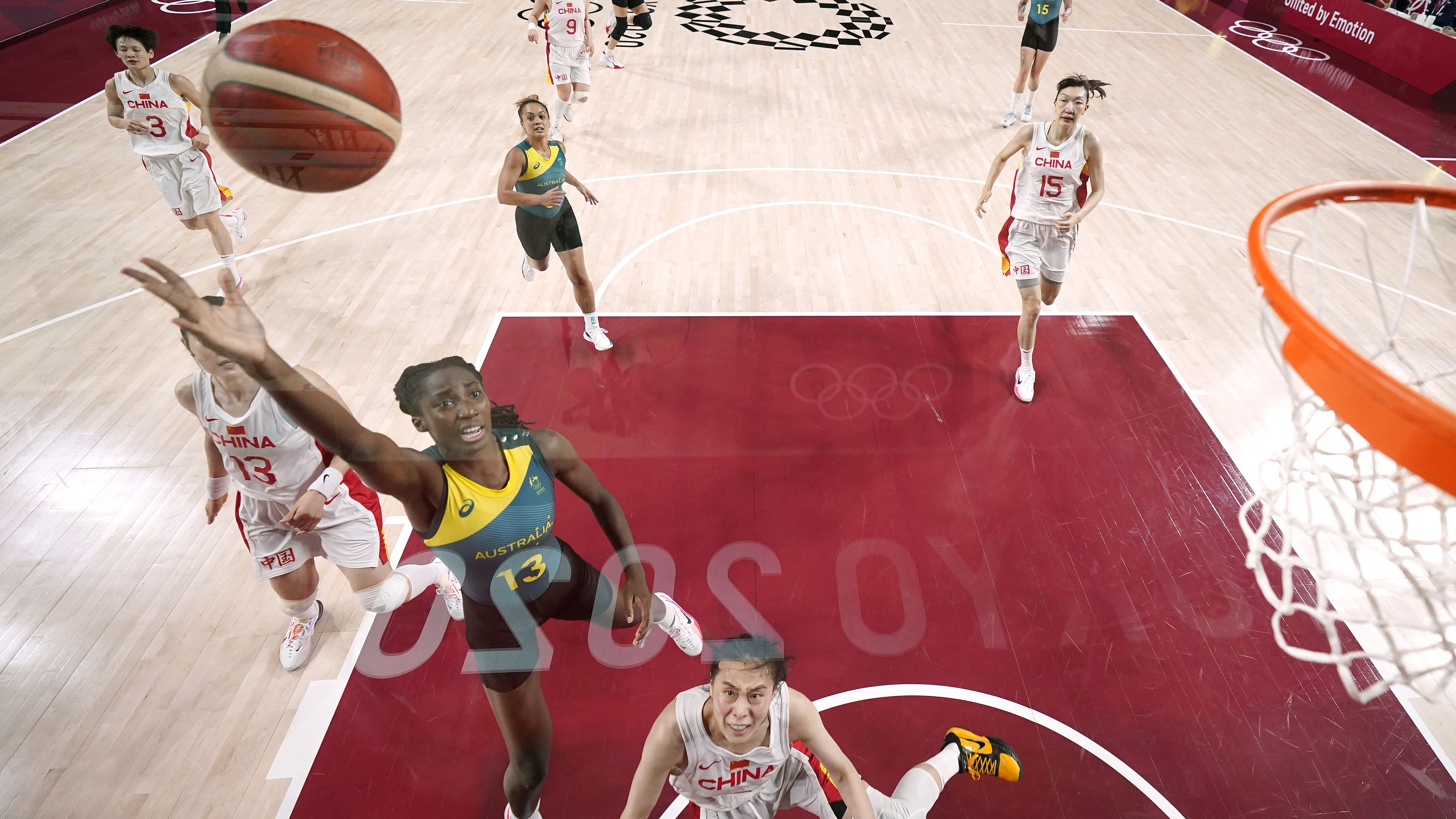 Australia&#x27;s Ezi Magbegor drives to the basket against China.