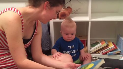 The parents have captured several moments where their baby sobs when a book has ended.