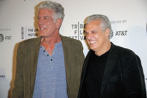 Bourdain pictured with long-time friend and fellow chef Eric Ripert last year. (Getty)