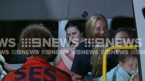 Some of the tourists rescued from the Big4 Caravan Park in Cairns in the middle of the night. Picture: 9NEWS