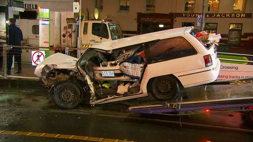 Two people were trapped in the crash this morning. (9NEWS)