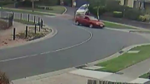 CCTV captured the moment the Mazda hit the curb. (9NEWS)