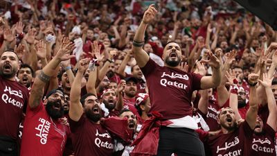 Qataris roar during WC opener