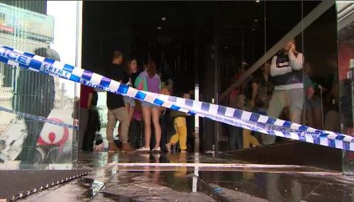 Terrified guests were forced to walk down flooded stairwells in the Melbourne CBD hotel building last night. Picture: 9NEWS