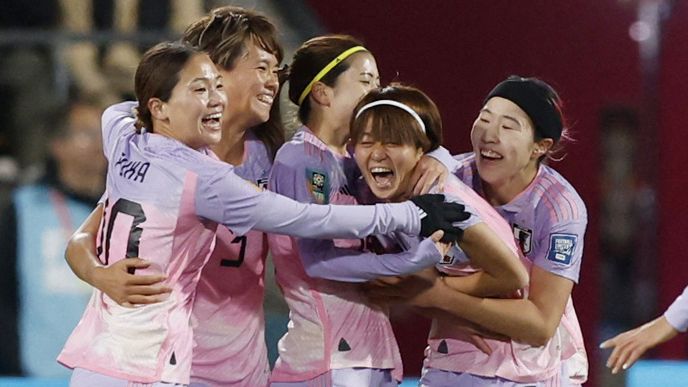 Japan players celebrate the own goal scored Norway&#x27;s Ingrid Syrstad Engen in the first half.