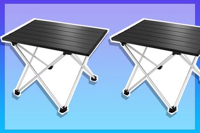 9PR: Black folding table for camping on blue and purple background.