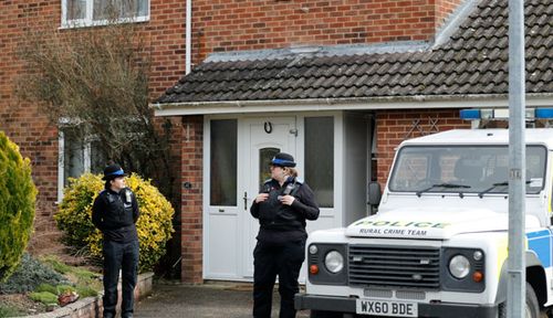 Police stand guard outside Mr Skripal's home. (AAP)