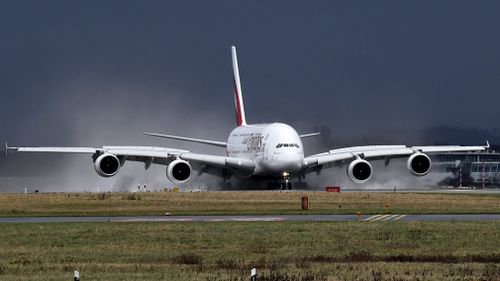 An Airbus A380-800 aircraft of UAE carrier Emirates comes in for a safe landing at Duesseldorf International Airport in Duesseldorf, Germany. (AAP)