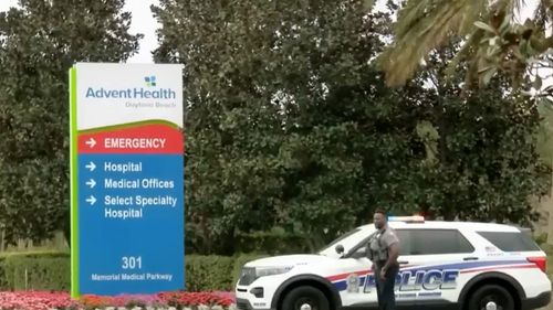 Police outside AdventHealth Daytona Beach near the central Florida coast