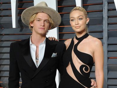 Cody Simpson, Gigi Hadid attends the 2015 Vanity Fair Oscar Party hosted by Graydon Carter at Wallis Annenberg Center for the Performing Arts on February 22, 2015 in Beverly Hills, California.