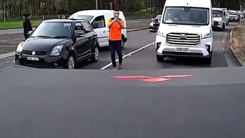 The driver of a ute has posted dash cam footage of a white van's prang on a Sydney road after an apparent dispute over who was in the wrong.