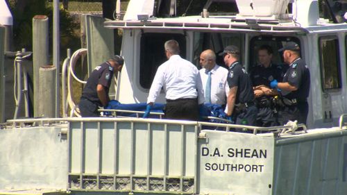Police say tattooed man's body that washed up on Gold Coast not suspicious