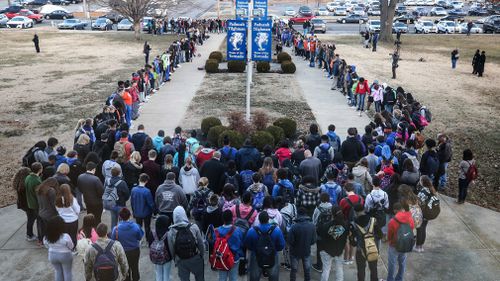 Paducah Tilghman High School held a prayer circle for victims of the Marshall County High School shooting. (AAP)