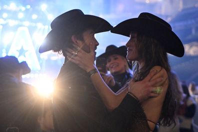 ARLINGTON, TEXAS - MARCH 08: Adan Banuelos and Bella Hadid attend The American Performance Horseman by Teton Ridge at Globe Life Field on March 08, 2024 in Arlington, Texas. (Photo by Click Thompson/Getty Images for Teton Ridge)