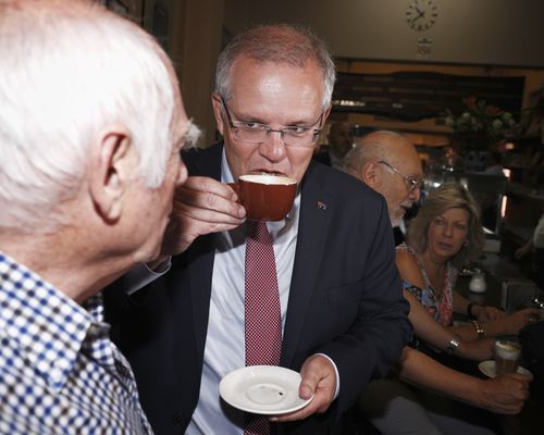 The Prime Minister samples some coffee at Pellegrinis.