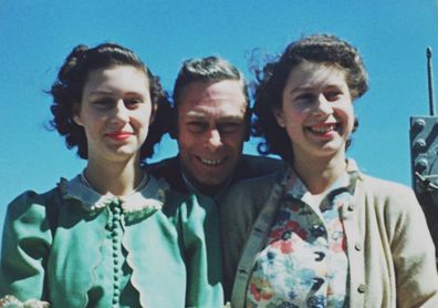 Another previously unseen picture shows the then Princess Elizabeth with Princess Margaret and their father King George VI