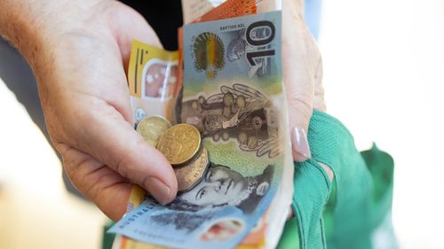 GEN23, Generic, cash payments, shopping, cost of living,  wages, withdrawal, atm, armaguard, groceries, in Sydney on April 1, 2024. 