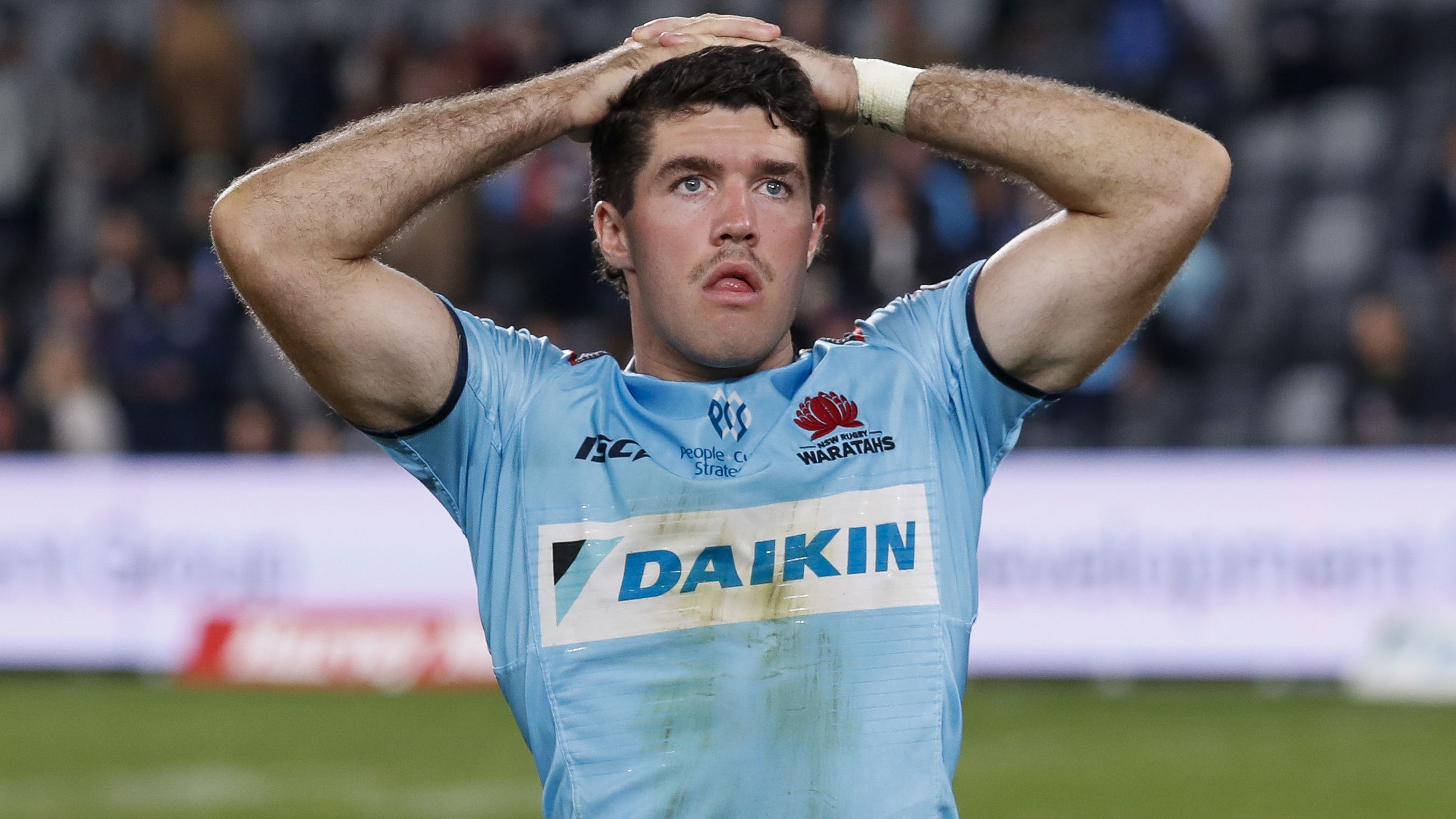 A dejected Ben Donaldson of the Waratahs after they were beaten by the Rebels.