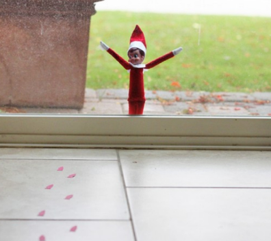 Elf on the Shelf locked out of the house.