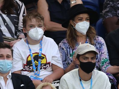 Dannii Minogue and son Ethan watches the Australian Open women's singles final between Ash Barty of Australia and Danielle Collins of the US 