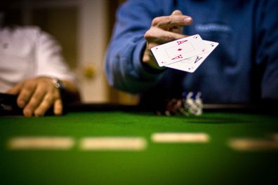 People playing card games at casinos