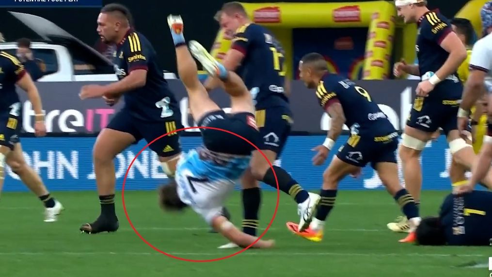 Highlanders player Sam Gilbert dumps Michael Hooper on his head.