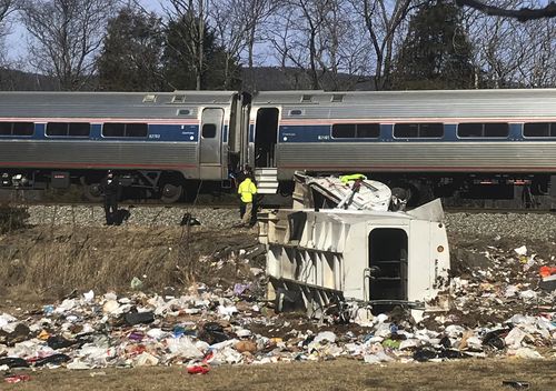 One person has died after the train collided with the garbage truck in Virginia. (AAP)